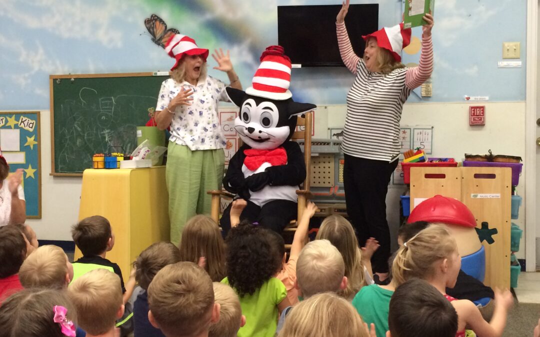 ELC volunteers Cathy Voss, Teresa Widman and special guest “The Cat in the Hat” enjoy story time at KidsFirst Learning Center in Middleburg.